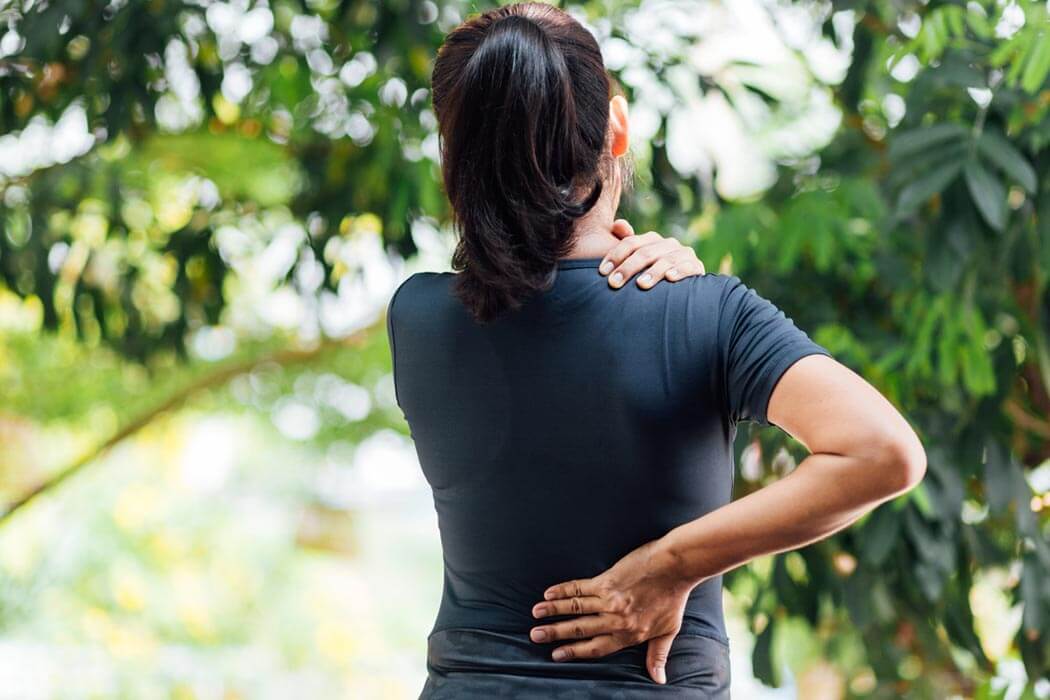 woman suffering from chronic back pain