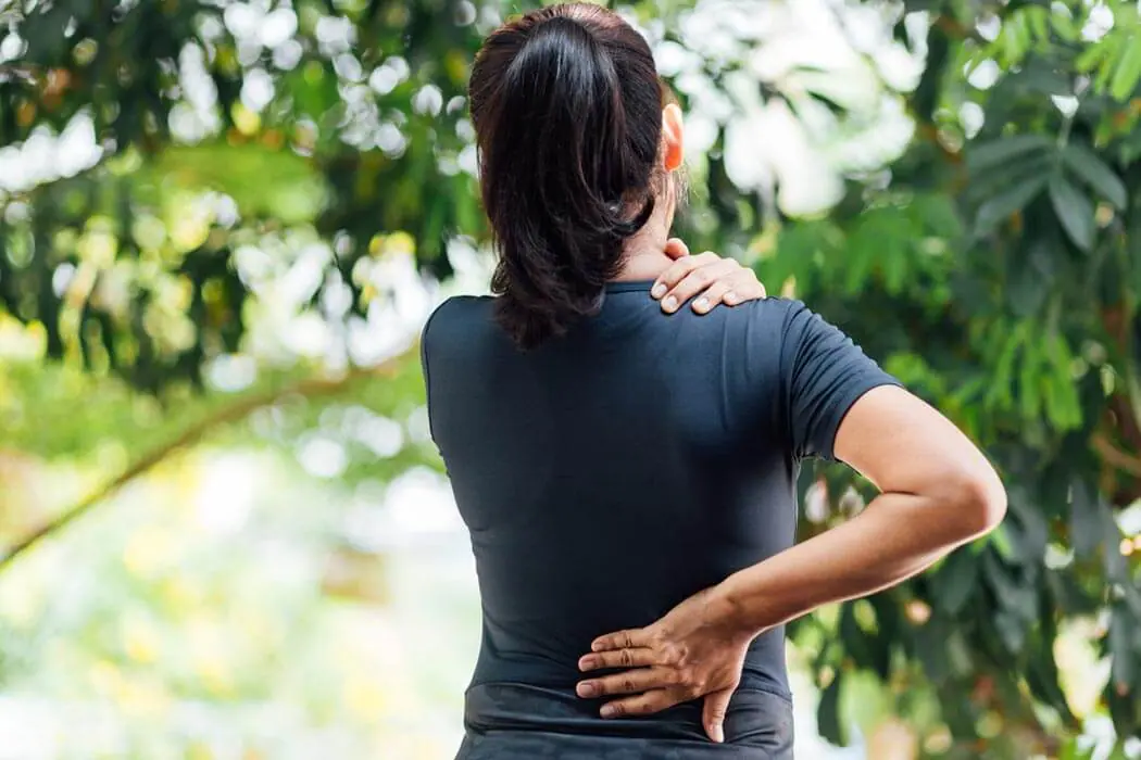 hp-about-us woman suffering from chronic back pain